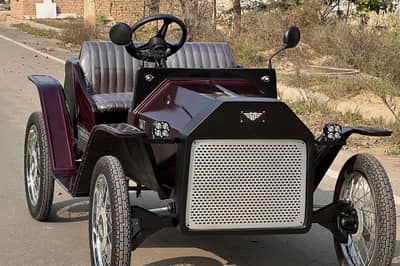 article, autos, cars, if you thought this was a vintage car think again. it is an ev made up of an enfield bike and an alto