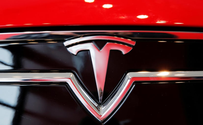 autos, cars, tesla, auto news, carandbike, covid-19, news, tesla delivers record vehicles in q1; output falls as china shutdown weighs
