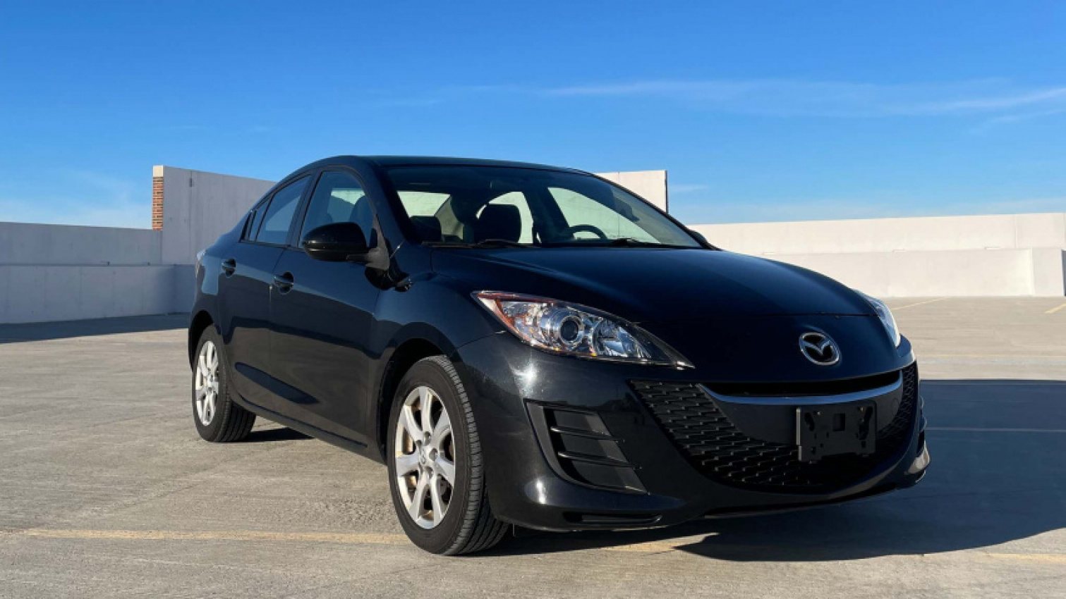 autos, cars, mazda, mazda 3, how i made almost $1,000 fixing and flipping a mazda 3 with a sticky dash