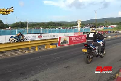 article, autos, cars, honda, a bajaj pulsar ns200 beating a honda africa twin in a drag race? yes, that happened!