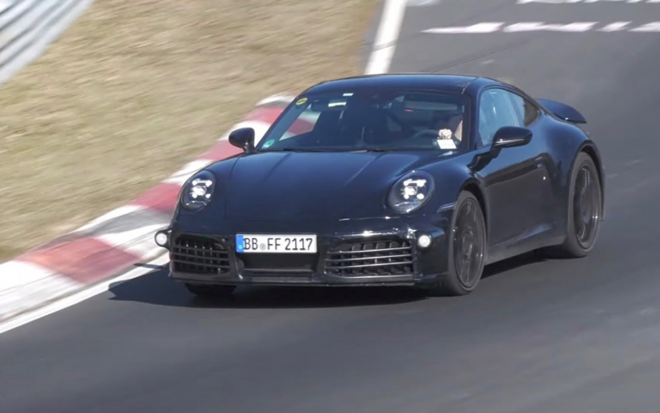 autos, cars, porsche, porsche spotted testing first-ever 911 hybrid at nurburgring (video)