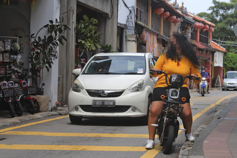 autos, cars, autos news, use e-scooters only on pavements, penang island city council warns riders