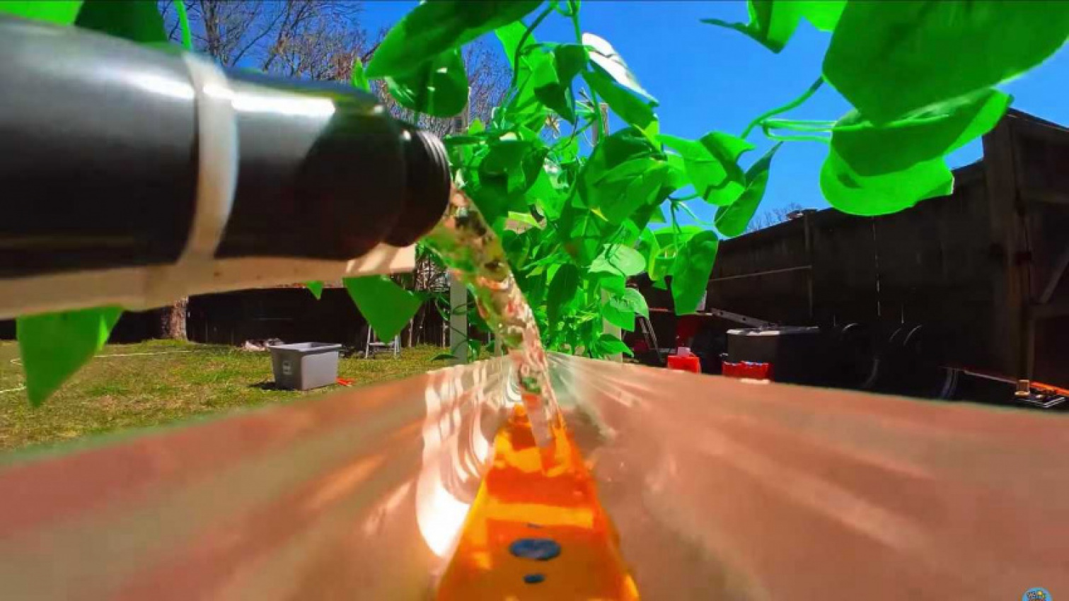 autos, cars, ride on wild hot wheels track featuring waterslides and a leaf blower