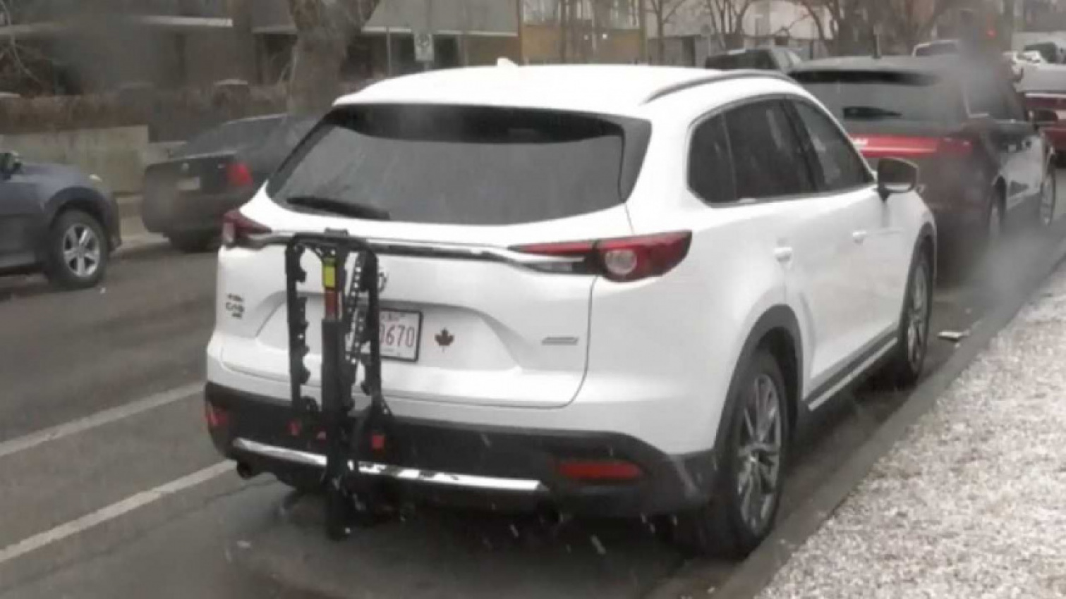 autos, cars, canadian driver gets huge fine for bike rack covering license plate