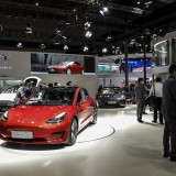 autos, business, cars, tesla, electric cars, elon musk, model 3, profits, tesla posts record first-quarter profits despite negative forecasts, supply chain issues and temporary factory closure