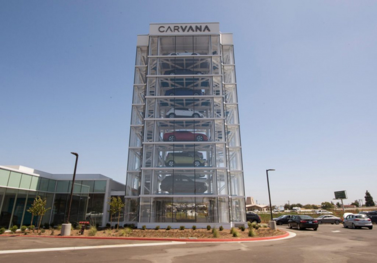 autos, cars, dealership, used car dealers, how do cars get in and out of the carvana vending machine tower?
