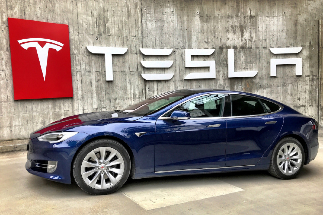 autos, cars, evs, tesla, vnex, is tesla's sales model poised to transform the auto industry?
