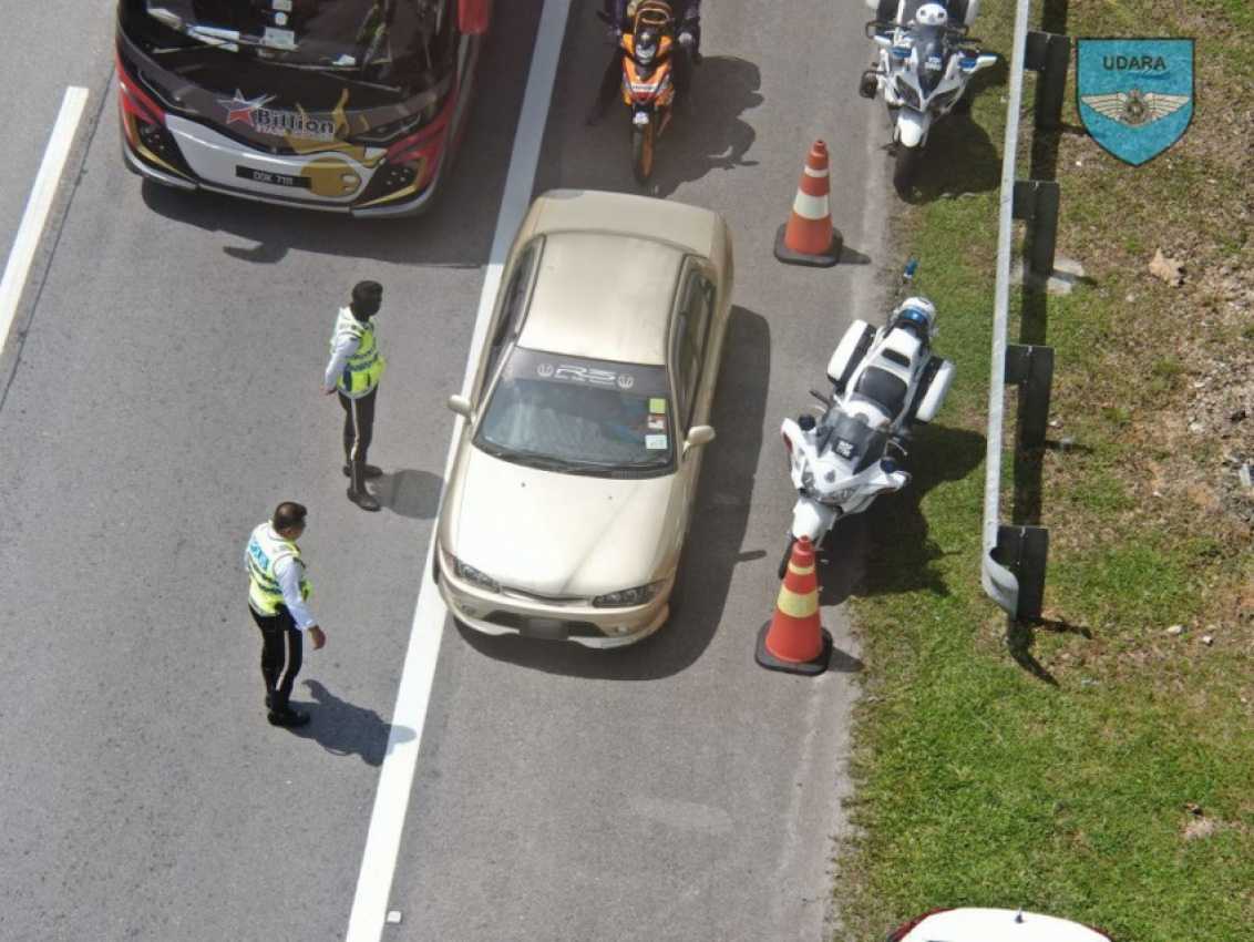 autos, cars, auto news, drone, drone surveillance, drone unit of the royal malaysia police, emergency lane, op selamat 18, pdrm, pdrm drones monitoring emergency lane drivers on highway