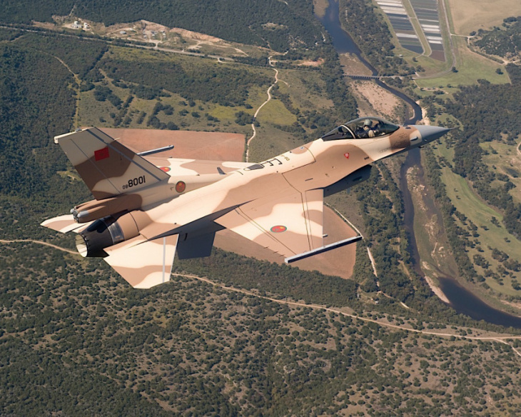 usaf shows rare up-close shot of f-16 fighting falcon flying over nascar field