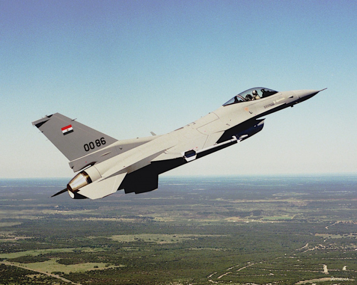usaf shows rare up-close shot of f-16 fighting falcon flying over nascar field