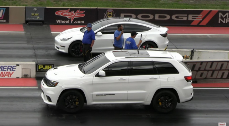 jeep grand cherokee trackhawk may be fast, but can it beat a tesla model 3?