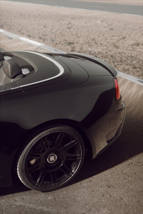 tuned rolls-royce dawn black badge has shapes some women would kill for