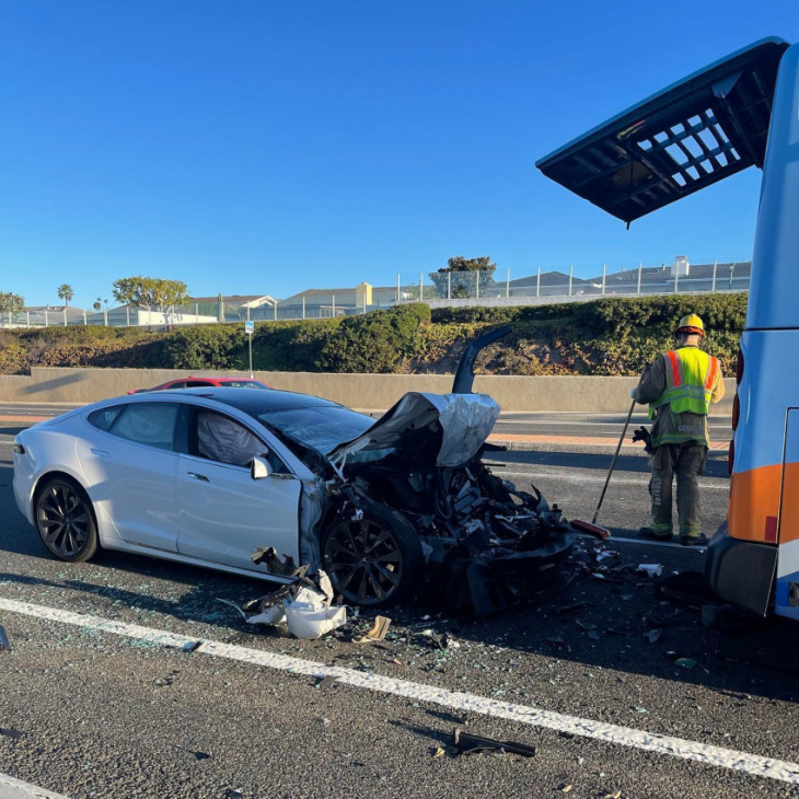 tesla crashes into back of bus in california