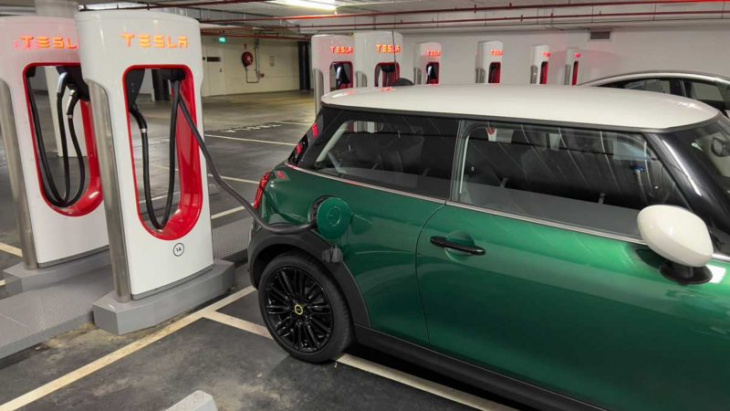 plugged-in mini sparks talk tesla may open up superchargers in australia