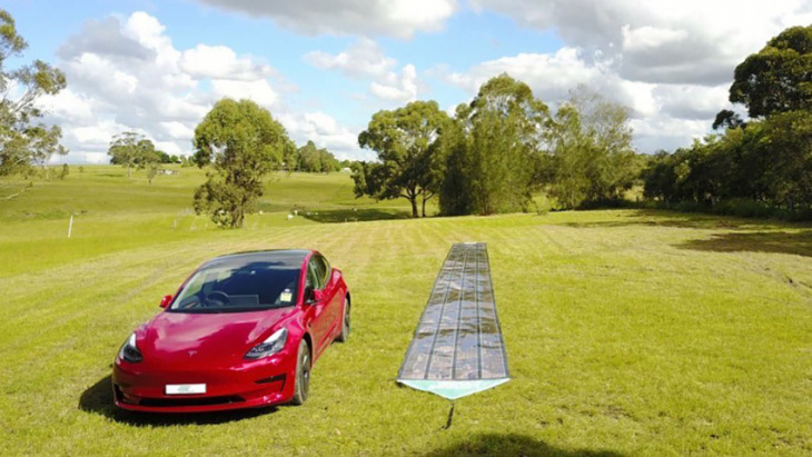 printed solar panels help a tesla model 3 circumnavigate australia