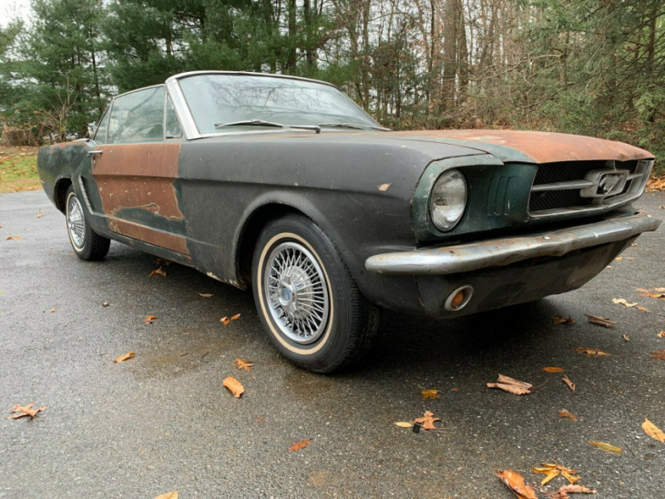 1965 ford mustang off the road for 43 years hopes you'll have a look under the hood