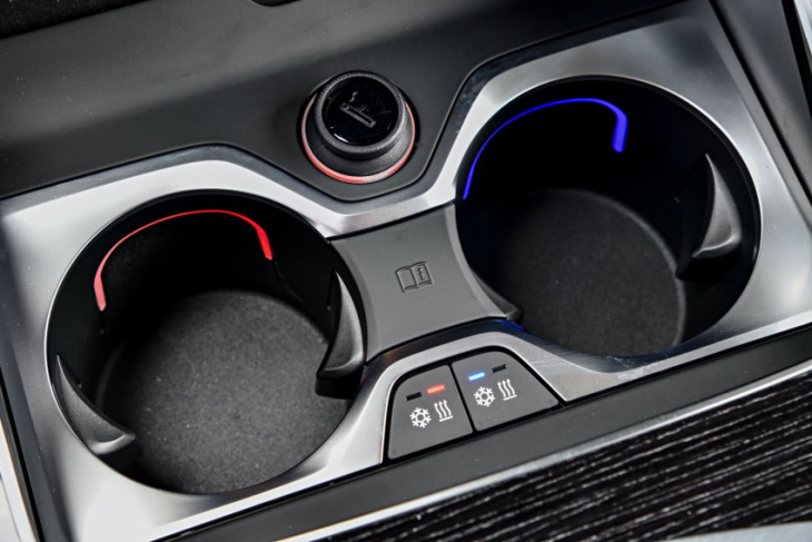 bmw hit with $5 million lawsuit over leaking cupholders as water can damage airbag parts