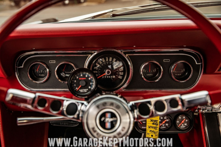 low-mile 1966 ford mustang fastback chants about classic red and black glory