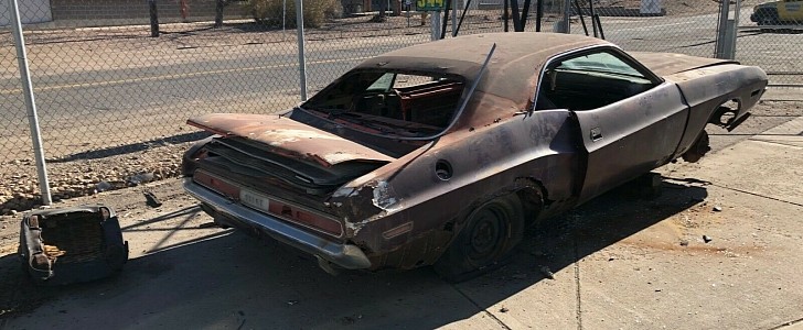 this 1970 challenger was left on the side of the road 30 years ago, the final goodbye
