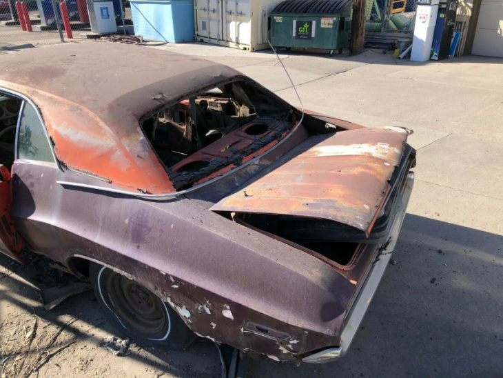 this 1970 challenger was left on the side of the road 30 years ago, the final goodbye