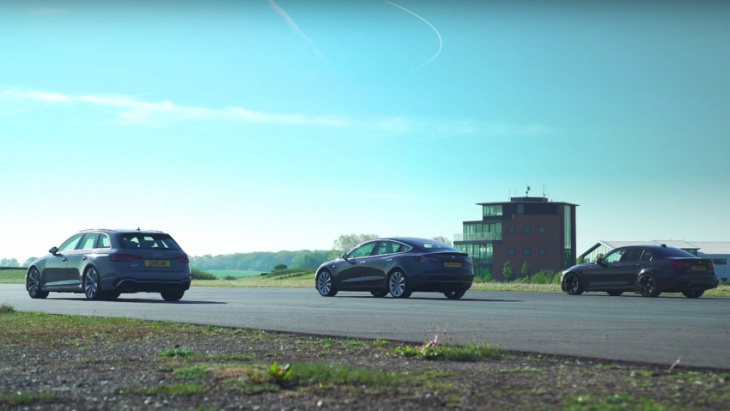 watch a tesla model 3 drag race a bmw m3 and audi rs4