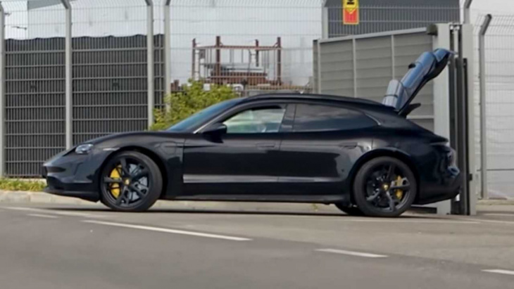 porsche taycan spied with the tailgate open at lamborghini factory