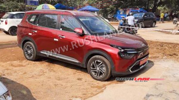 android, kia carens red colour automatic dct top variant spied undisguised