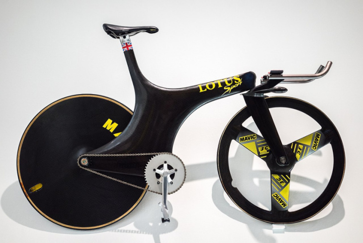 lotus cars is building a bicycle, while aston's making a motorcycle
