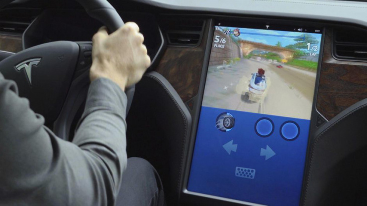 nhtsa shuts down tesla's passenger play feature after investigation