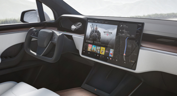 game over: tesla disables gaming while driving after federal probe