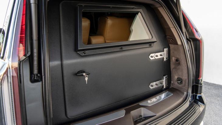 this armored escalade looks like a caddy, protects like a tank