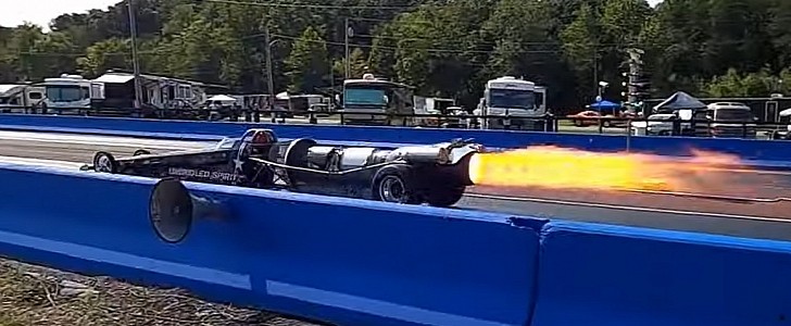 watch a jet-powered, flame-spitting dragster hit almost 300 mph on the quarter-mile