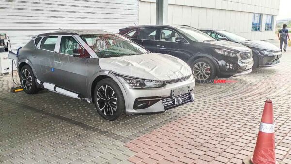 kia ev6 electric spied in red, silver, black, white colours – new teaser