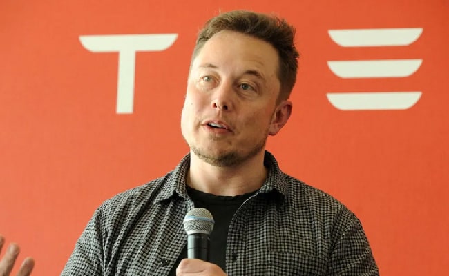 musk says he will stay at tesla as long as he is useful