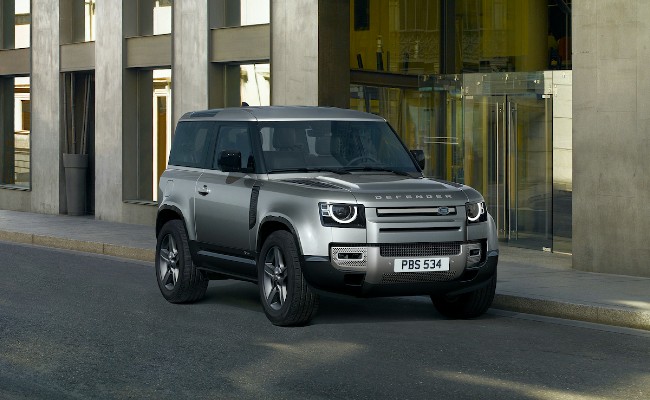 land rover defender 130 with 8 seats teased ahead of debut this month
