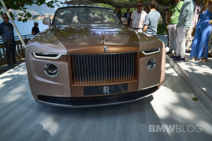 rolls-royce boat tail looks stunning on the shores of lake como