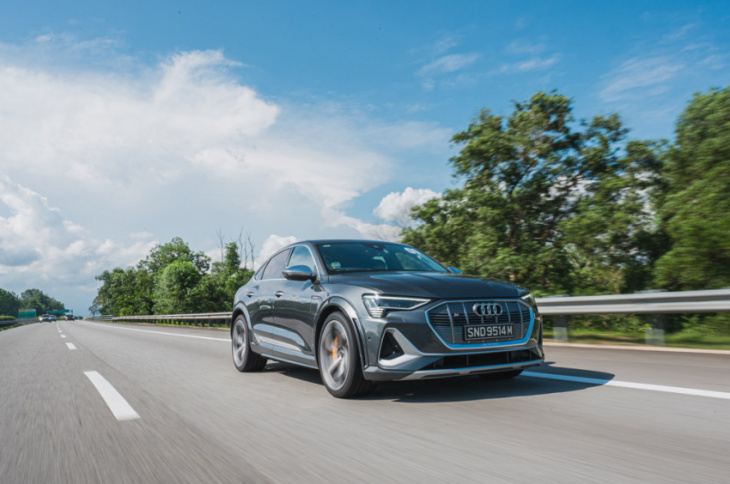 audi e-tron models zap and crackle on this electrifying road trip