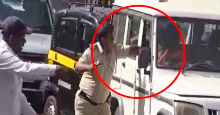 cop slaps mahindra bolero owner for not getting out of minister's way fast enough