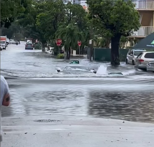 watch: chevrolet c8 corvette swims through flooded street