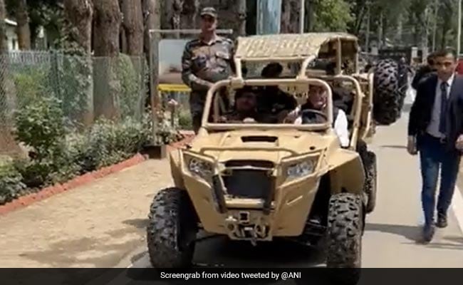 defence minister rajnath singh drives an atv in kashmir