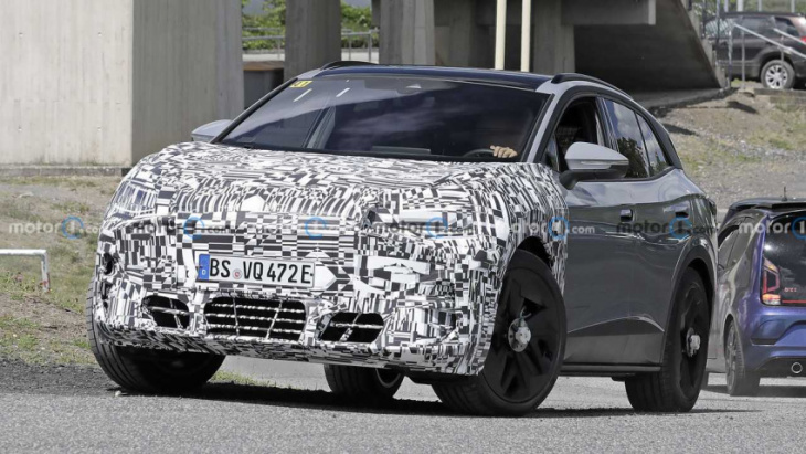 production cupra tavascan spied disguised as a vw id.4