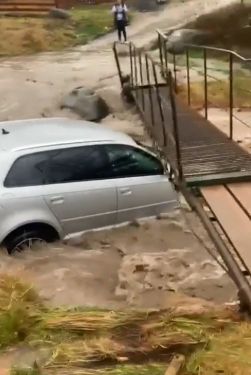 driver attempts to cross river, mother nature provides a physics lesson