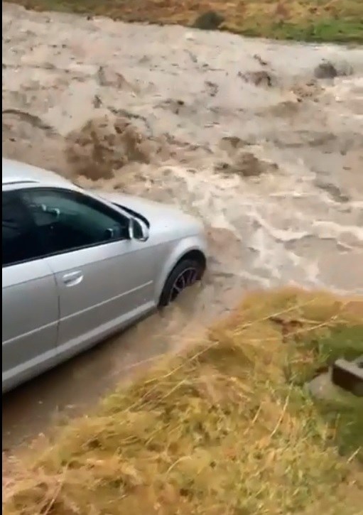 driver attempts to cross river, mother nature provides a physics lesson