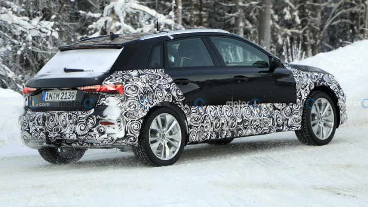 new audi a3 spy pics catch high-riding hatch playing in the snow