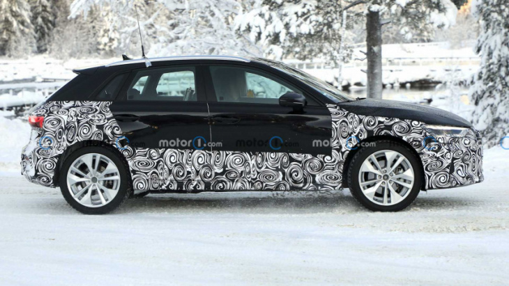 new audi a3 spy pics catch high-riding hatch playing in the snow