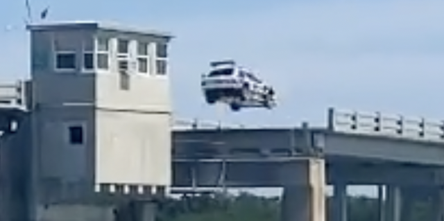 watch travis pastrana jump his subaru gl wagon over a bridge in florida