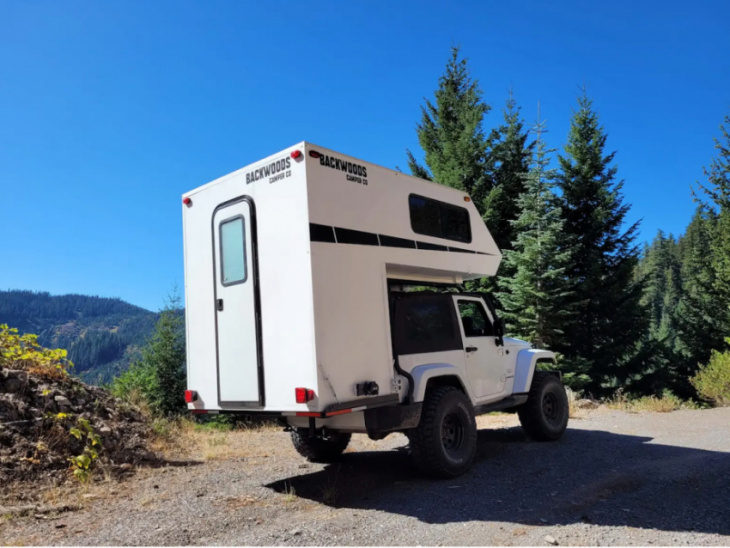 new backwoods camper shell adds a king size bed to your 2-door jeep wrangler