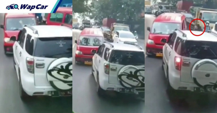 video: angry toyota rush driver in indonesia forces queue-jumping van to reverse