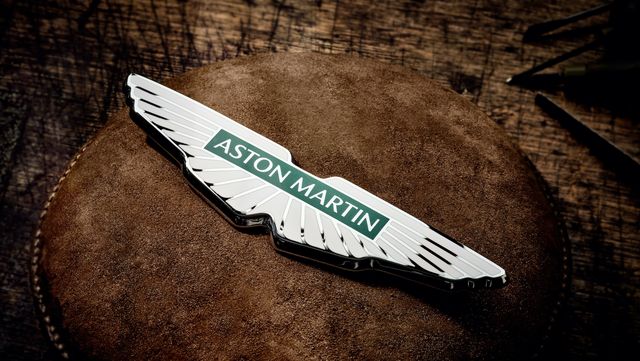 aston martin reveals new version of its classic wing logo, along with reinvestment plan