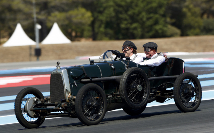 sebastian vettel takes to the track in a 100-year-old racer